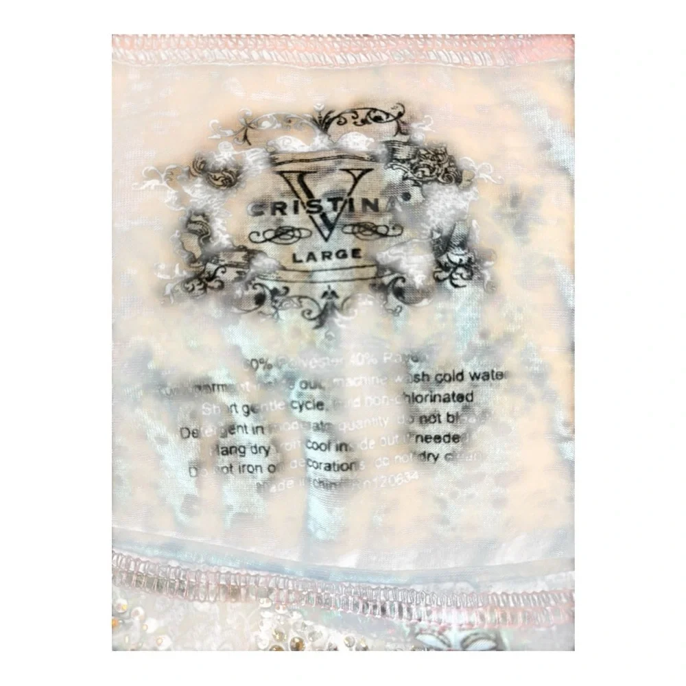 V Cristina long-sleeved top featuring a ruffled hem and embellished details - Picture 6 of 6